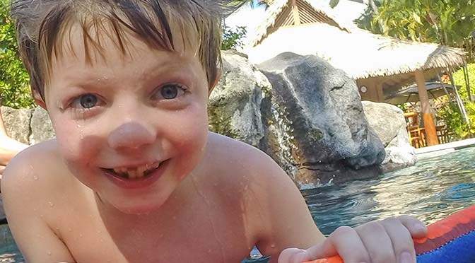 charlie enjoying the pool in kona hawaii